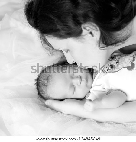 Similar – Mother and cute little baby girl sleeping