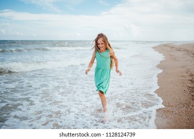 Beautiful Little Girl On Beach Funny Stock Photo 1128124739 | Shutterstock