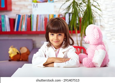 beautiful little girl pretending she is a doctor in hospital