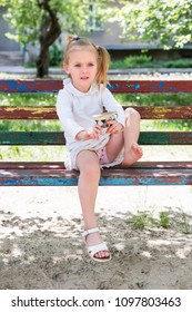 little girl wearing flip flops