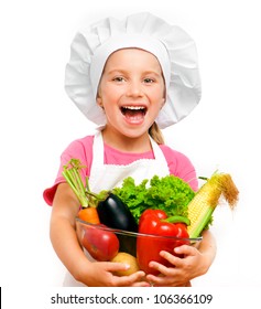 beautiful little girl with vegetables on a white background
