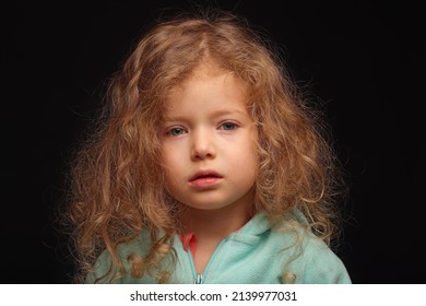 Beautiful Little Ill Girl With A Full Runny Nose And Has Difficulty Breathing Under The Common Cold, Flu. Isolated Portrait With Black Background.