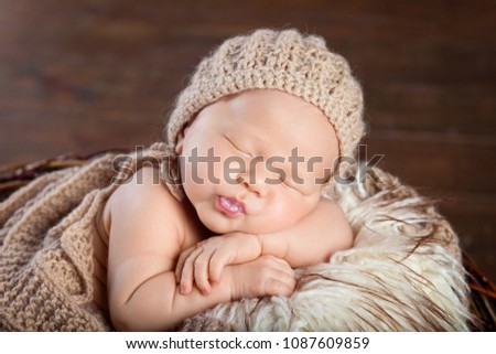 Similar – Baby girl wrapped in a blanket