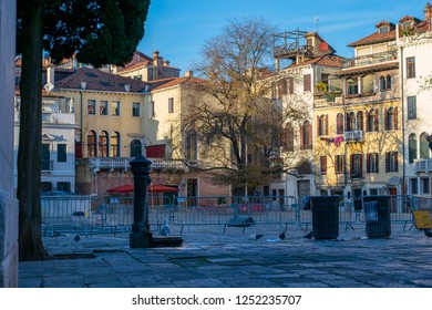 Beautiful Little Plaza Surrounded By Venetian Buildings, Candid Moment Of Venice's Life 