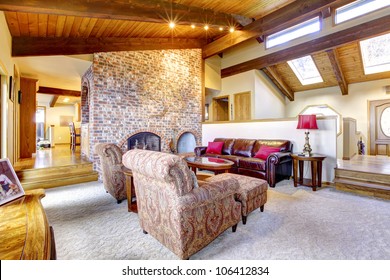 Beautiful Living Room With Wood Ceiling And Sky Lights.