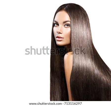 Beautiful long Hair. Beauty woman with luxurious straight brown hair. Beautiful brunette Model, Healthy Hair. Lady with long smooth shiny straight hair. Hairstyle, cure. Isolated on white background