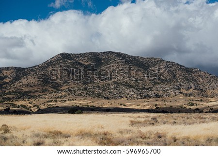 beautiful longroad in california with mountain view and beautiful sky