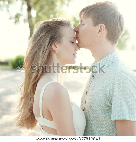 wodka na wesele - beautiful love romantic couple kissing 450w 327812843