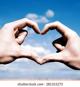 Beautiful Love Shape Hands - Heart On Yellow Field And Blue Sky