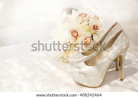 Beautiful luxury bouquet and heels for bride
