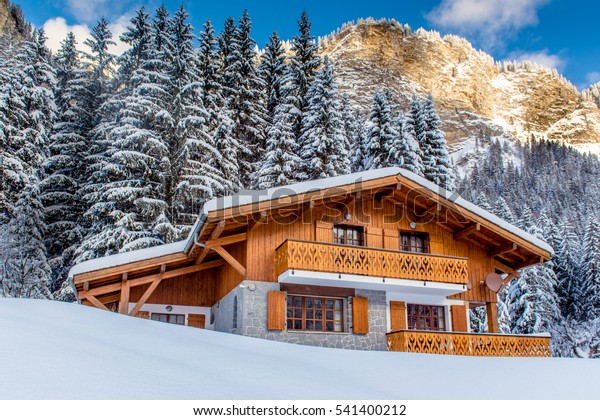 Beautiful\
luxury chalet in French Alps in the\
winter.