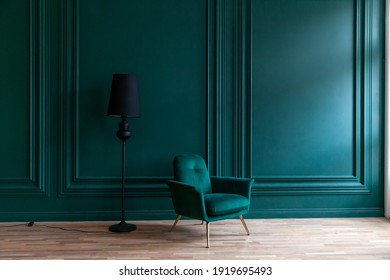 Beautiful luxury classic blue green clean interior room in classic style with green soft armchair. Vintage antique blue-green chair standing beside emerald wall. Minimalist home design - Shutterstock ID 1919695493