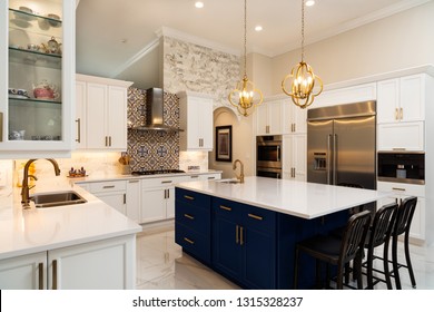 Beautiful luxury home kitchen with white cabinets. - Shutterstock ID 1315328237