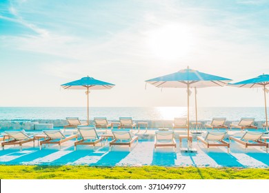 Beautiful Luxury Hotel Swimming Pool Resort With Umbrella And Chair - Vintage Filter