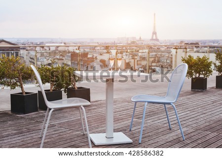 beautiful luxury rooftop restaurant in Paris with panoramic view of the city