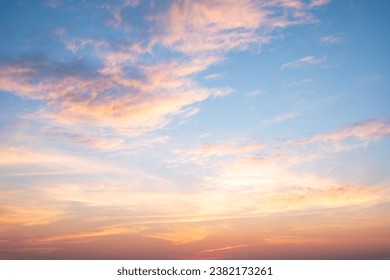 Beautiful of luxury soft gradient orange gold clouds and sunlight on the blue sky perfect for the background, take in everning,Twilight - Powered by Shutterstock