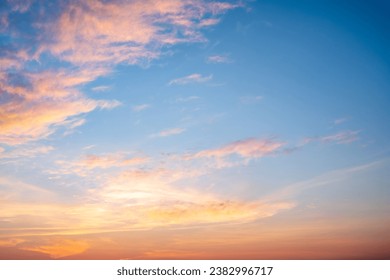 Beautiful of luxury soft gradient orange gold clouds and sunlight on the blue sky perfect for the background, take in everning,Twilight - Powered by Shutterstock