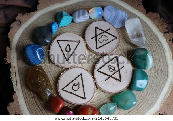 Beautiful and magical hand made four elements\
symbols with\
gemstones