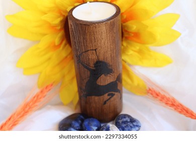 Beautiful and magical wooden candle holder with astrological sagittarius sign