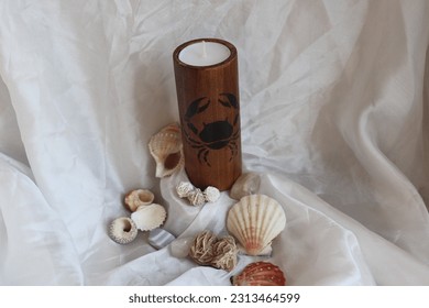 Beautiful and magical wooden candle holder with astrological zodiac sign cancer symbol - Powered by Shutterstock