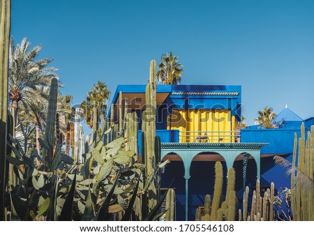 The beautiful Majorelle Garden is a botanical ,tropical garden and artist's landscape garden in Marrakech, Morocco. Le Jardin has a water fountain painted in Majorelle Blue.