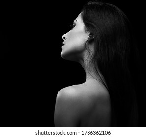 Beautiful Makeup Sexy Woman With Nude Back On Black Background With Empty Copy Space. Closeup Profile View Portrait. Art.Expression. Black And White