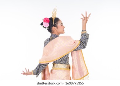 A beautiful Malaysian traditional female dancer wearing traditional dance outfit. Half length portrait isolated in white. Landscape orientation.