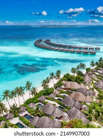 Beautiful Maldives Paradise. Tropical Aerial Travel Landscape, Seascape With Wooden Bridge, Water Villas, Amazing Sea Sand Sky Beach, Tropical Island Nature. Exotic Tourism Destination Summer Vacation