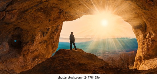 beautiful  man  mainsail  and cave mountains background quest - Shutterstock ID 247784356