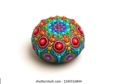 Beautiful Mandala Painted On A Rock , Isolated On White Background