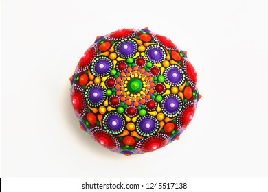 Beautiful Mandala Painted On A Rock , Isolated On White Background