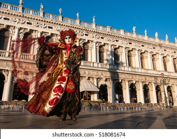 Beautiful Mask At St. Mark Square During The Carnival Of Venice.