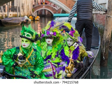 Beautiful Masks In Gondola At The Carnival Of Venice.