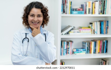 Beautiful Mature Adult Doctor With Copy Space Indoors At Office