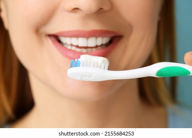 Beautiful Mature Woman Brushing Teeth, Closeup