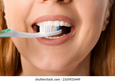 Beautiful Mature Woman Brushing Teeth, Closeup