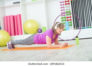 Beautiful Mature Woman Exercise Elbow Plank, In GYM, Fitness Concept, Horizontal Photo