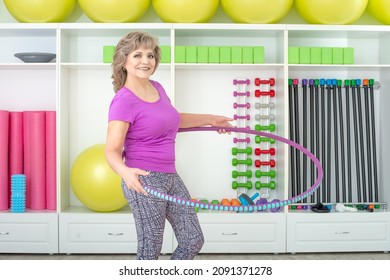 Beautiful Mature Woman With Hula Hoop In GYM, Fitness Concept, Horizontal Photo
