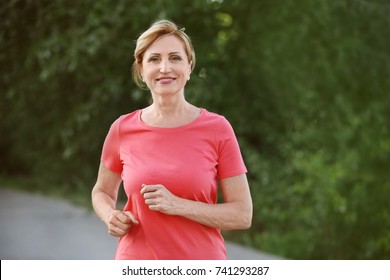 Beautiful Mature Woman Running Outdoors