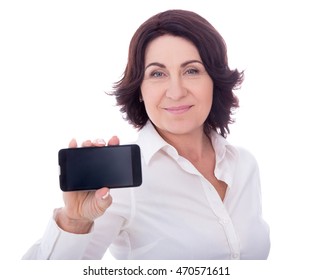 Beautiful Mature Woman Showing Phone With Blank Screen Isolated On White Background