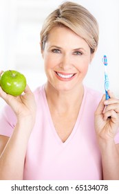 Beautiful Mature Woman With A Toothbrush.