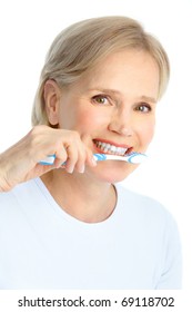 Beautiful Mature Woman With A Toothbrush.