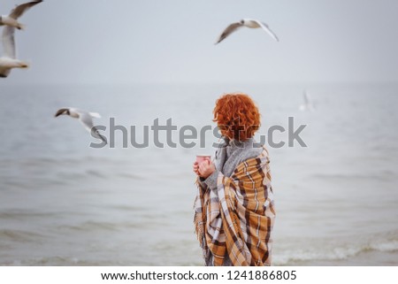 Similar – Senior sportswoman looking at the sea