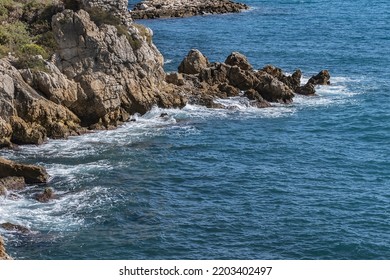 Beautiful Mediterranean Coastline Under Blue Sky In Antibes - City On French Riviera Between Cannes And Nice.