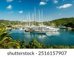 Beautiful mega and superyachts at dock in English Harbour, a famous caribbean island of Antigua know for yacht season