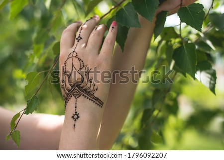 beautiful mehendi on female hands