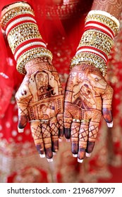 Beautiful Mehndi Henna Design On Hands Of Indian Bride Showing Mehndi Tattoos Design
