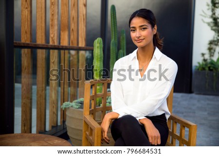 Beautiful mental and social therapist sitting relaxed and dignified in retreat center Stock photo © 