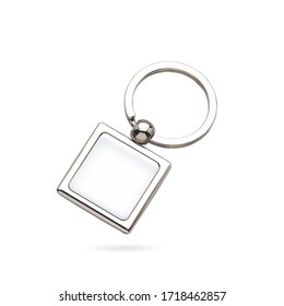 Beautiful metal square keychain with silver key ring and logo placeholder with domed label. Keychain isolated background. Dome label keychain.