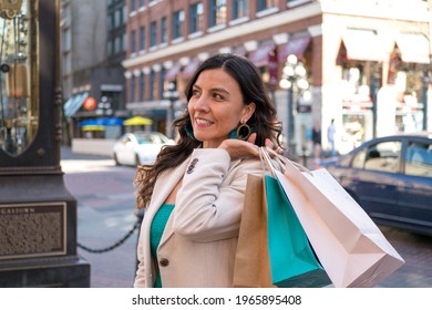 A Beautiful Mexican Woman In Her Thirties Enjoying Shopping In Downtown Canada